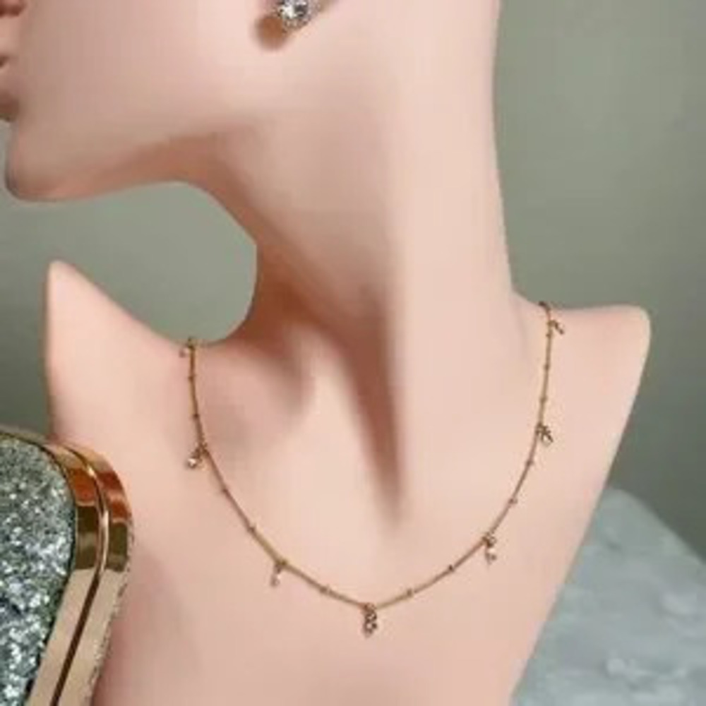 Elegant Long Gold Necklace with Crystal Charms